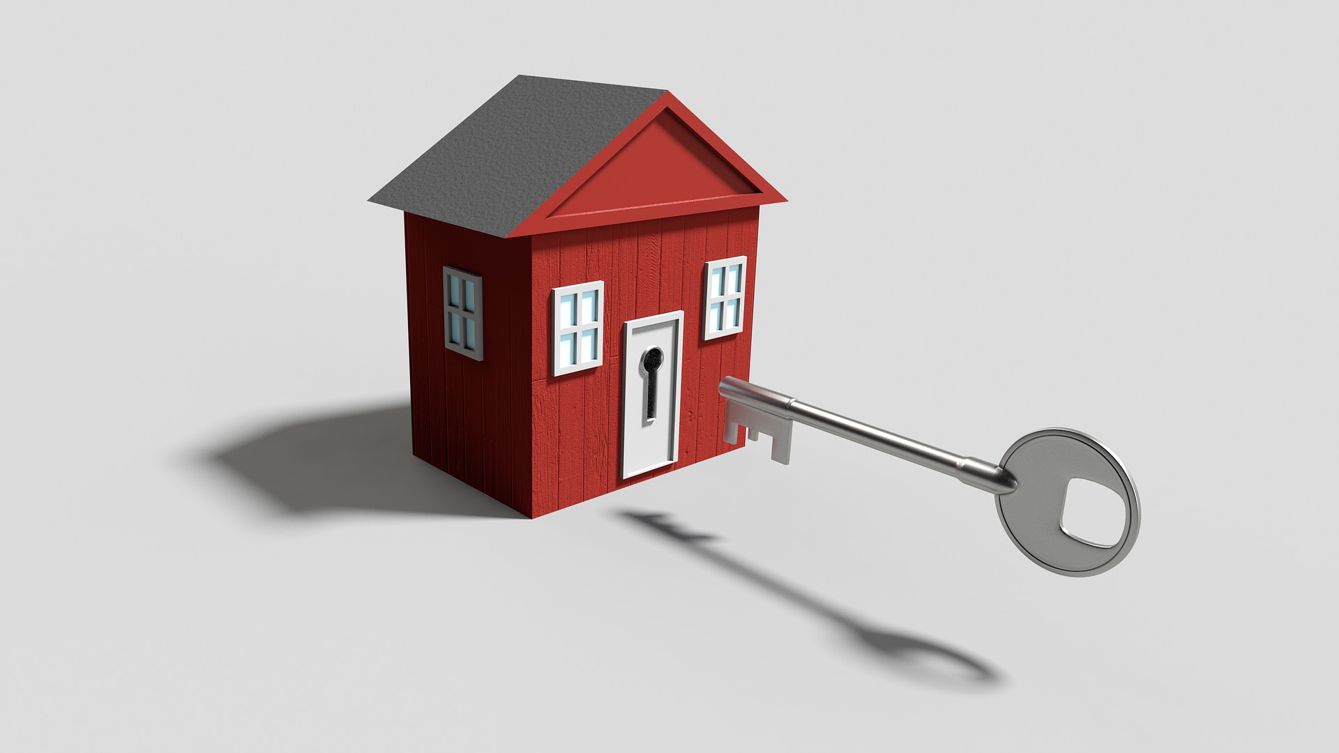 Red small house and a floating key